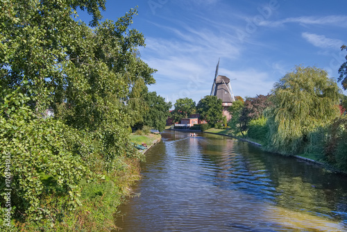 Fényképezés Windmill at Knockster Tief Siel,Hinte,Aurich District,East Frisia,Germany