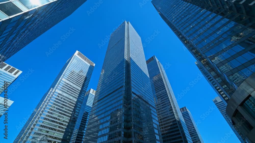 Ascending Skyscrapers: Modern Architecture Against Azure Sky Ascending Skyscrapers: Modern Architecture Against Azure Sky