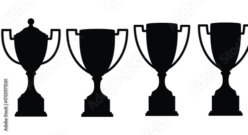 Collection of four black trophies silhouettes celebrating victory and achievement in sports vector