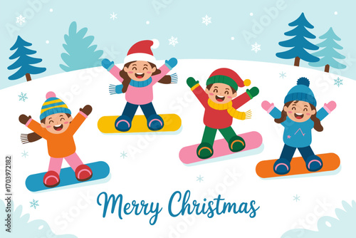 Joyful children in winter hats and snowsuits snowboarding down a snowy hill
