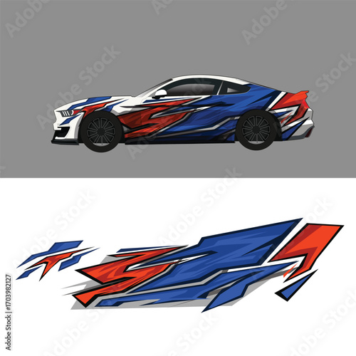 Aggressive sports car wrap sticker livery with sharp geometric shapes in blue, orange, and white.