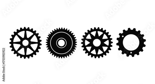 Set of four distinct black gears and cogs with visible teeth symbolizing mechanics and engineering precision vector