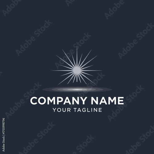 A minimalist, abstract logo featuring a radiant starburst emanating light, set against a dark background with a subtle glow beneath.