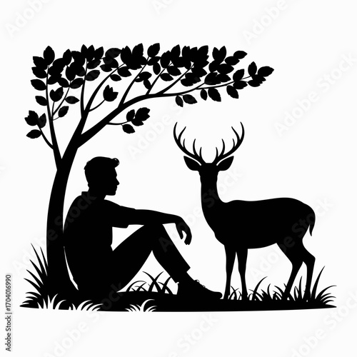 silhouette of a tree with deer