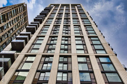 Modern Apartment Buildings with Cream Facades and Balconies  in London, UK.