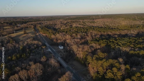 Aerial landscape rural forest winter sunset after Hurricane Helene in Newton County Georgia