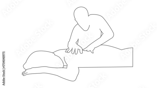 Professional masseur massages the back of a person lying in a prone position with two hands