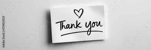 Simple thank you note with heart illustration