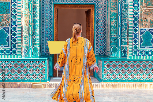 Young woman in a traditional robe at the Shah-i-Zinda complex.