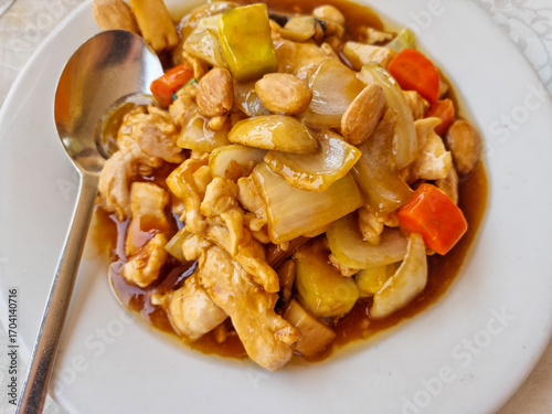 A dish of Asian food, chicken with almonds