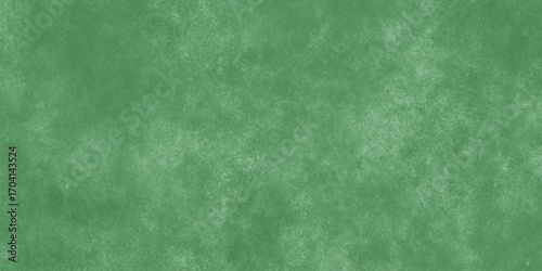 Abstract Elegant dark green background with mottled vintage texture in old fancy background design, texture of colored parchment paper.