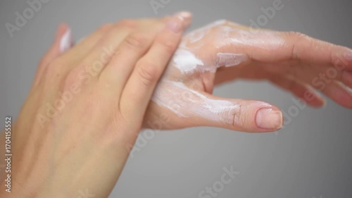 Moisturizing hand cream application for healthy, manicured nails and soft skin care