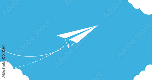 White paper airplane soars across bright blue sky leaving dotted trail, symbolizing travel and dreams.