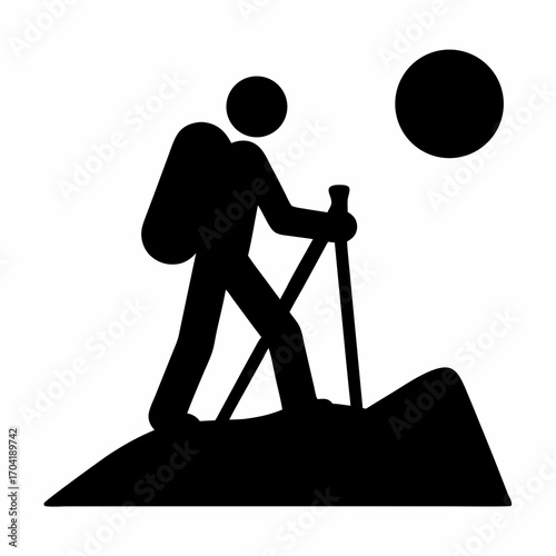 Black Silhouette of Hiker with Backpack Climbing Mountain under Round Sun