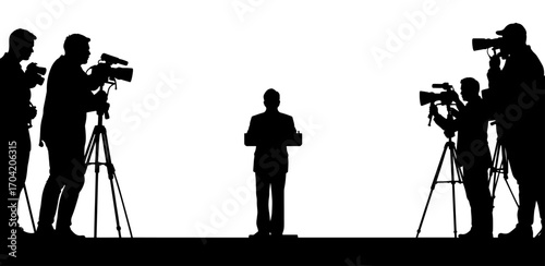 Person giving speech to press photographers silhouette