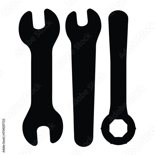 Set of Three Black Wrench Silhouettes Against White Background for Toolboxes