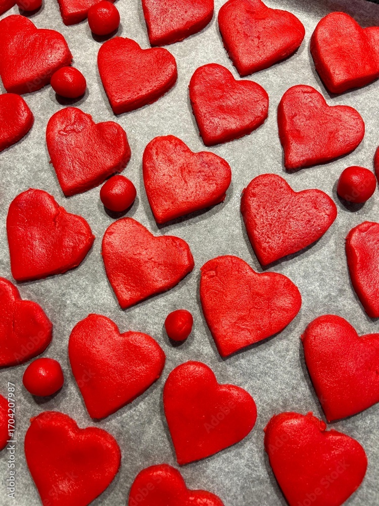 Fototapeta premium red hearts on a white background, red cookies