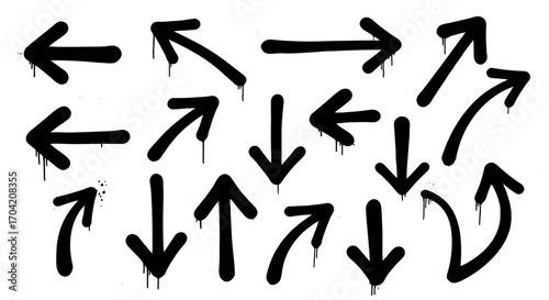 Collection of black spray painted arrows pointing in various directions