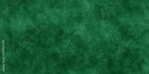 Abstract Elegant dark green background with mottled vintage texture in old fancy background design, texture of colored parchment paper.