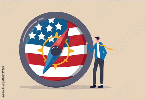 World and United States economic direction after presidential election, direction of US Federal Reserve, FED in financial crisis concept, businessman leader stand with compass with USA national flag.