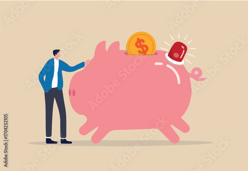 Emergency funds prepared to pay for unexpected situation in life, loss a job, economic crisis causing income cut or accident concept, smart man standing with piggy bank with emergency siren light.