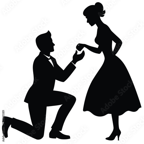 Silhouette of a man proposing to a woman with a ring 