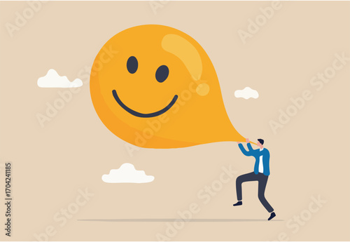 Maximize happiness, let go anxiety and think positive concept, man blow big smile yellow balloon.