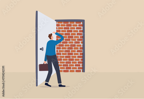 Business dead end, no way to exit or big mistake and wrong decision, obstacle and difficulty to overcome concept, businessman open exit door and found brick wall blocking the way.