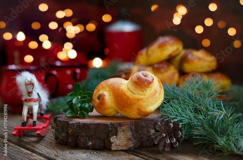 Lussekatter, lussebulle - traditional Swedish homemade saffron buns on the St. Lucia day 13 december