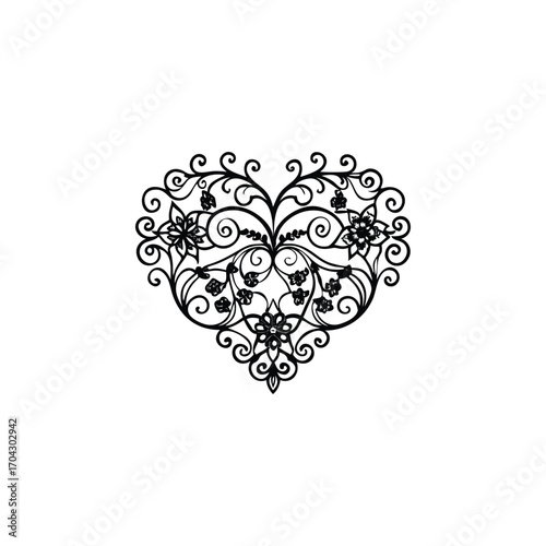 Intricate black filigree heart ornament with floral details and swirling patterns