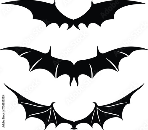 Stylized bat silhouette set, black wings design, gothic flying creature, Halloween icon, fantasy bat shapes, vertical layout, spooky art