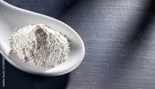 Enhancing Wellness With Food Supplement L Glutamine Powder On White Spoon