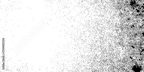 An abstract black and white grunge background with transparent water droplets and bubbles on a wet glass surface