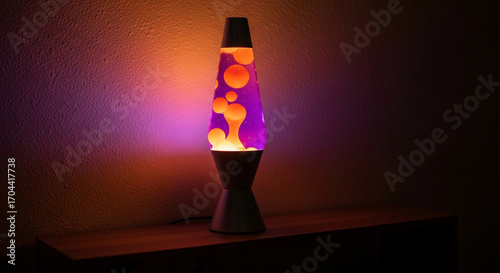 Glowing Retro Lava Lamp in a Cozy, Dark Room