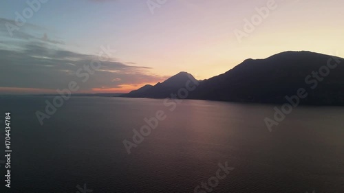 Aerial Sunset Over Lake Garda: Drone Flight from Porto di Brenzone, Brenzone sul Garda, Italy