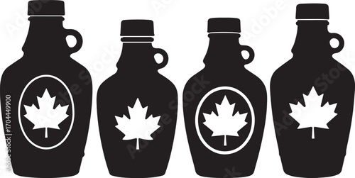 Four black maple syrup bottles with white maple leaf labels silhouette