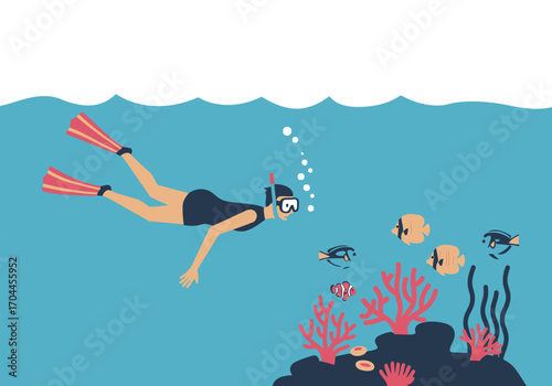 Woman snorkeling in clear blue ocean water, exploring vibrant coral reef with tropical fish and bubbles, enjoying underwater adventure
