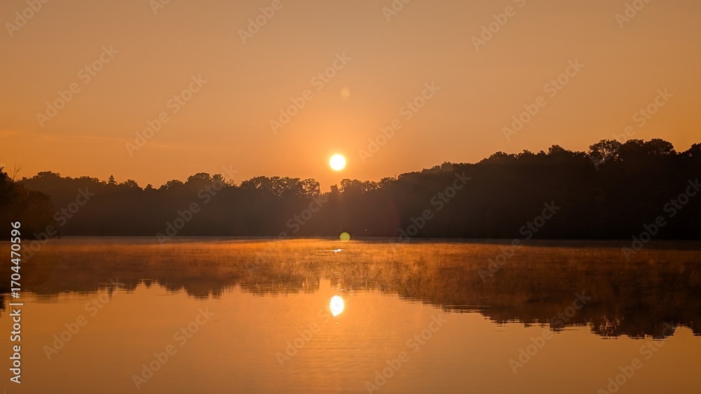 Naklejka premium sunrise over the river