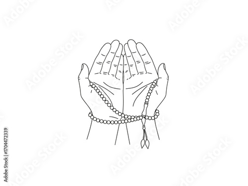 Hands holding rosary beads in prayer or meditation