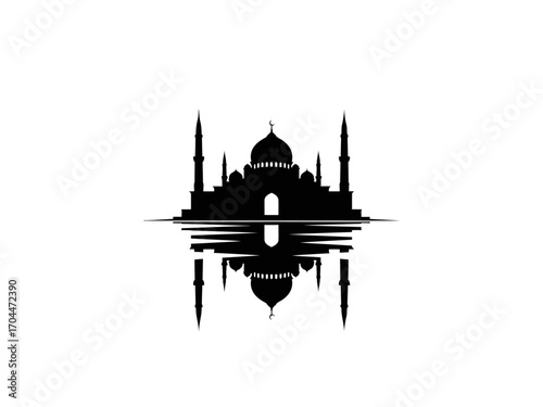 Silhouette of a grand mosque with reflection on water