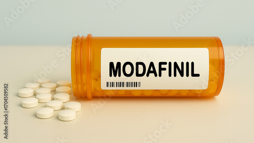 Photos Box of MODAFINIL tablets on a hospital pharmacy table used to treat narcolepsy a wakefulness promoting agent