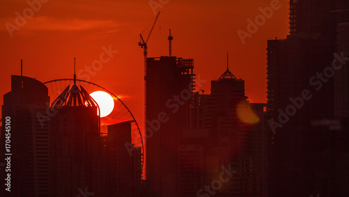 Dubai Marina skyscrapers from golf course sunset timelapse, Dubai, United Arab Emirates