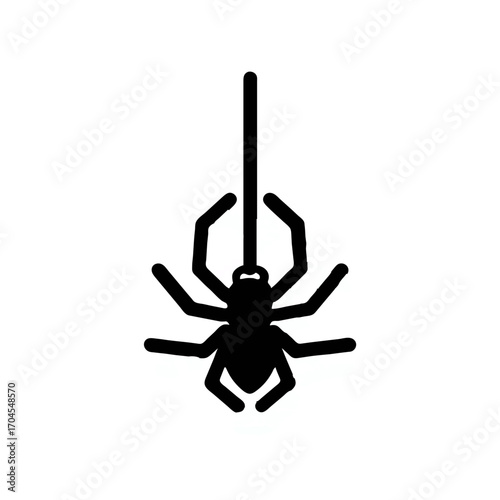Black spider hangs ominously from string for Halloween

