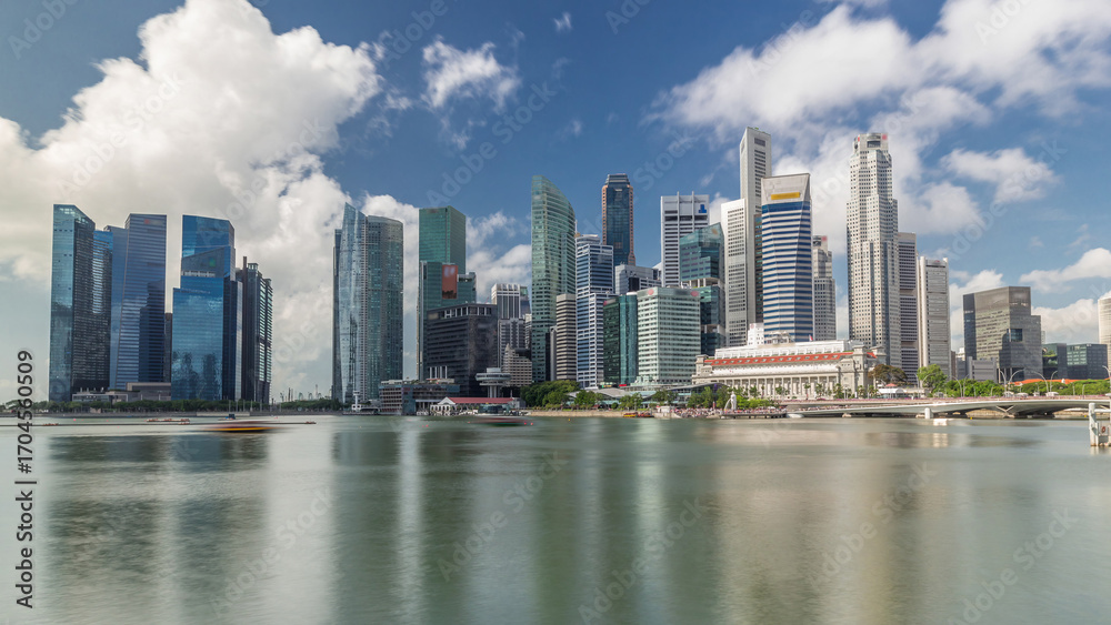 Fototapeta premium Business Financial Downtown City and Skyscrapers Tower Building at Marina Bay timelapse hyperlapse, Singapore,