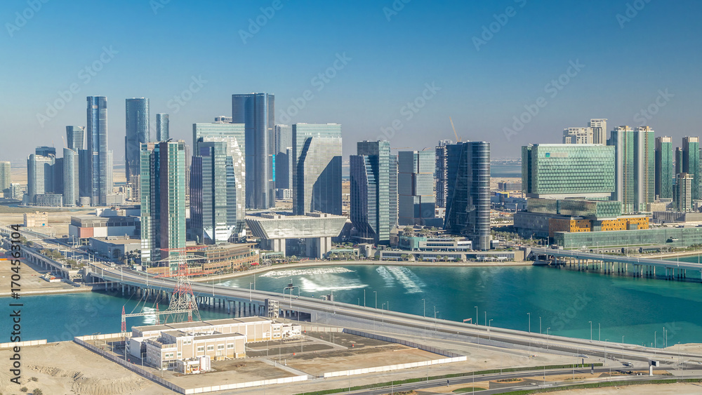 Fototapeta premium Aerial skyline of Abu Dhabi city centre from above timelapse