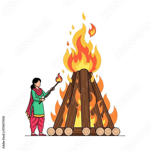 Lohri Celebration - Woman Lighting Bonfire for the Festival of Lohri.