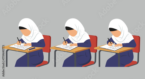 Three Muslim Female Students Wearing Hijabs in Blue Uniforms Taking Examination in Classroom with Red Chairs and Wooden Desks