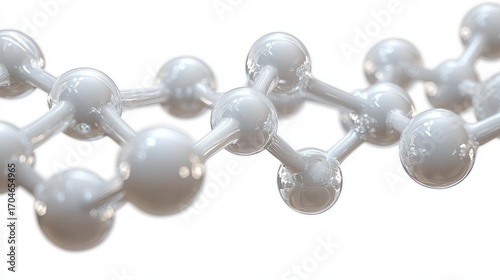 Close-up of a shiny white molecular structure model with interconnected spherical atoms and smooth bonds against a bright background