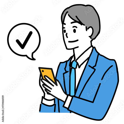 笑顔でスマホをチェックする若いビジネスマン