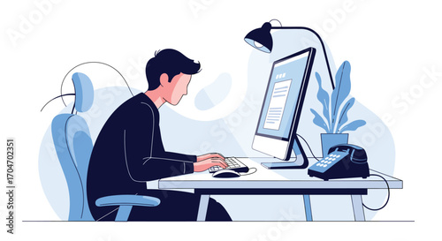 Young man diligently working on a computer at a desk with a lamp and plant